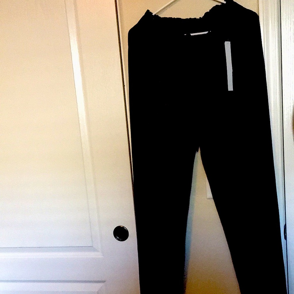 Womens XL Trouser pants with tags-dark blue with red stripes.Comfortable/classy.